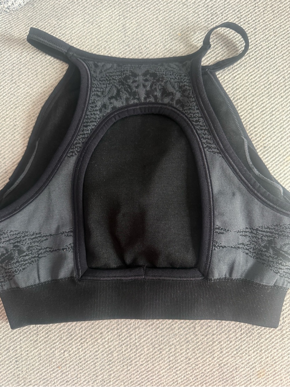 NUX Black Racerback High-Neck Sports Bra with Cutout Back